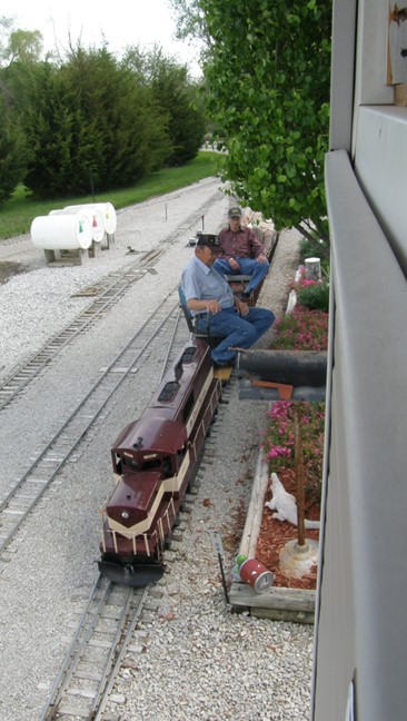 Pat and HK taking a ride past the interlocking tower